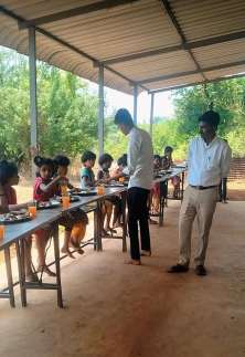 Facilitators and children during a learning activity